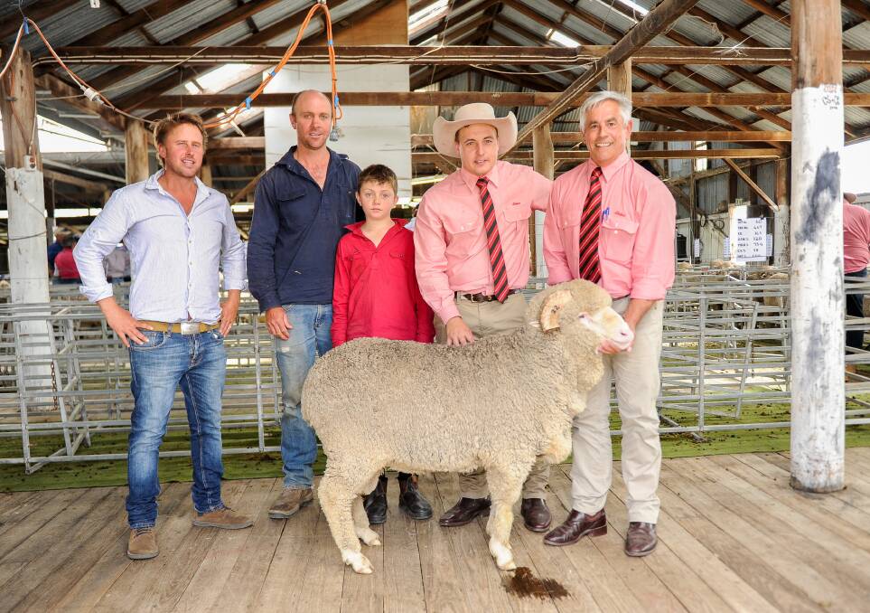 Vendor Jock Nivison with buyers Charlie and Freddie Street and Elders agents Lincoln McKinlay and Tom Henry with the $8500 top price ram. 