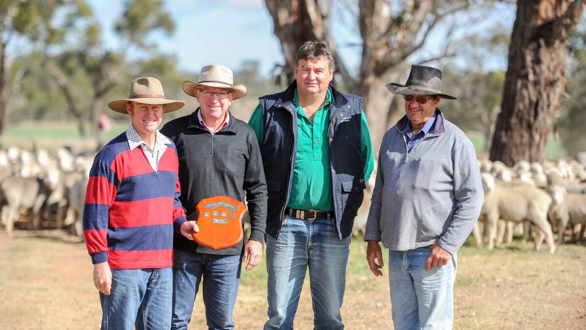 Trophy presenter John Chappell, entrant John Newsome, Northern Tablelands LLS sheep officer Brent McLeod and livestock technical assistant Peter Newman with the trial wethers. 