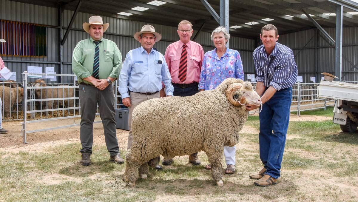 Landmark stud stock specialist Brad Wilson, AWN's Harold Manttan representing buyers Maids Valley Partnership, Matherson, Elders agent John Newsome, and vendors Alison van Eyk and Des Carlon with the $1800 top price ram.  