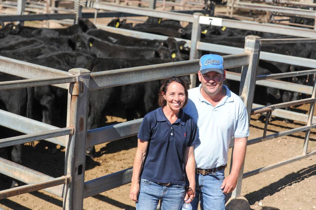 Natasha and Elliott McKinnon of Dales Angus, Merriwa, with their Angus steers that topped at 660c/kg. 