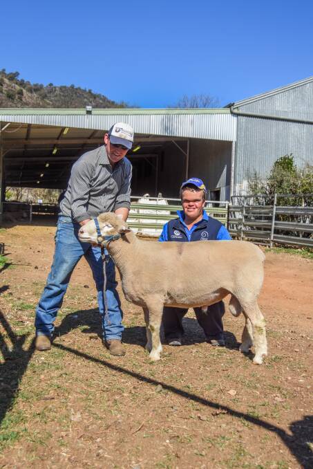 The second top price ram sold for $2200 to James Gilmour, White Gold Poll Dorset stud, Coolatai, (right) and is pictured with vendor Marshall Douglas. 