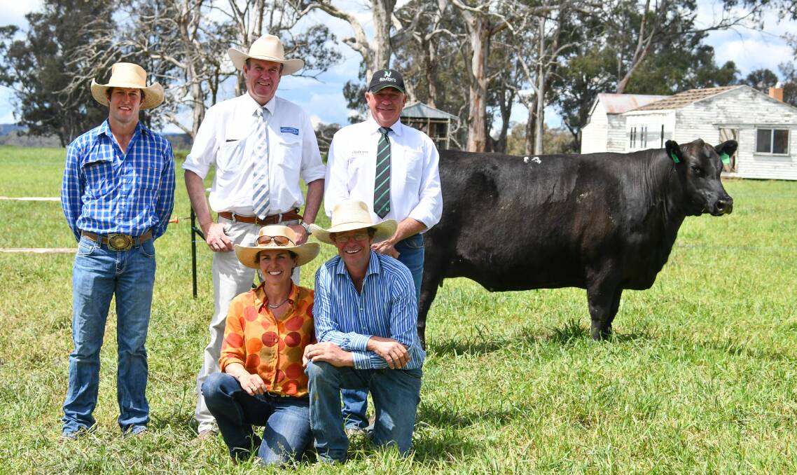 The $82,000 top price female with Stuart Hobbs, auctioneer Paul Dooley, beside agent Miles Archdale of Nutrien Boulton's Walcha and vendors Erica and Stu Halliday, Ben Nevis Angus, Walcha. 