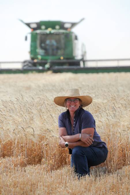 Vicki Gall, Wallambah, Moree with their barley crop on Monday. 