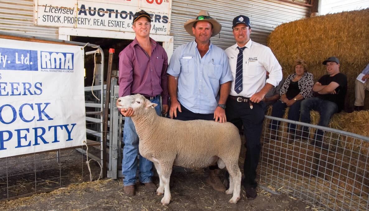 Yasloc's Nick Say with top price buyer Hugh McCowen of Tenterfield High School and Colin Say and Co's Shad Bailey with the top price ram. 