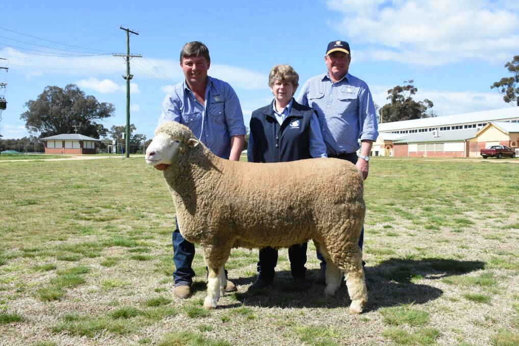 James, Lorraine and Brian Frost of Hillden Poll Dorsets, Bannister, with their top price ram. Photo: Shantelle Stephens