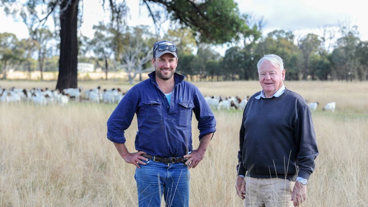 Merilba Station manager Peter Barker and owner John Cassidy with some of their Boer goats. 