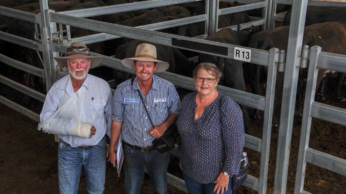 Fred and Chris Paterson with the cows and calves from Bellfields Grazing, Gowrie, and purchaser Glennie Scott, Rosewood, Mullaley. 