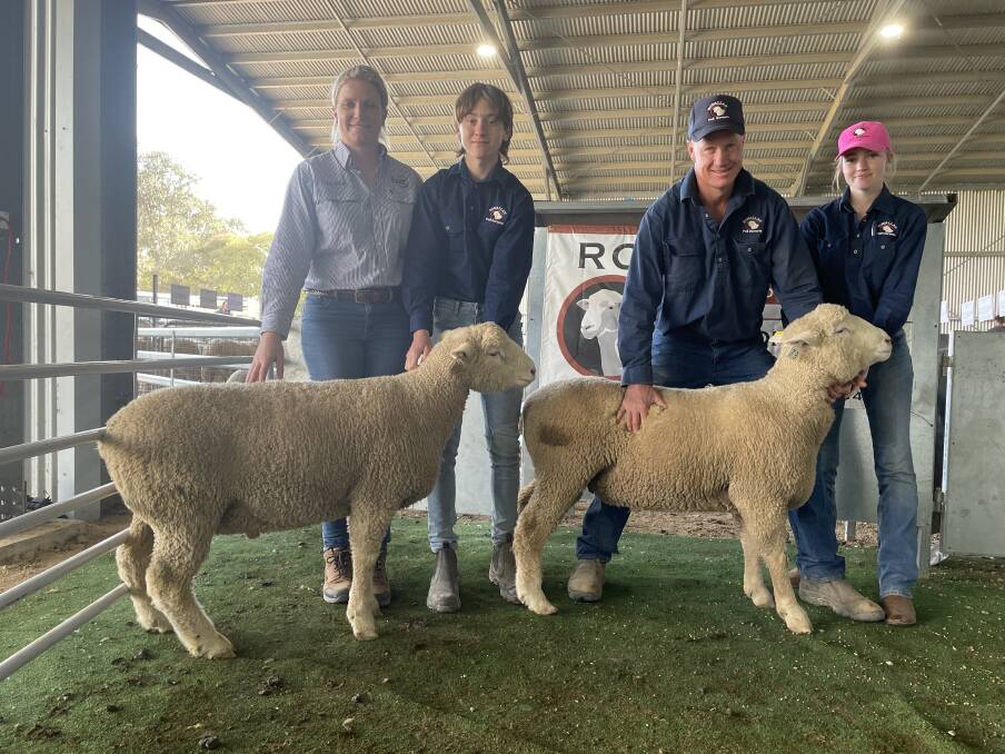 Butt Livestock and Property principal Sally Butt, Yass, with Nate, Matt and Kaitlin Reid, Rowallan Poll Dorset stud, Crowther, and the two $4400 top priced rams. 