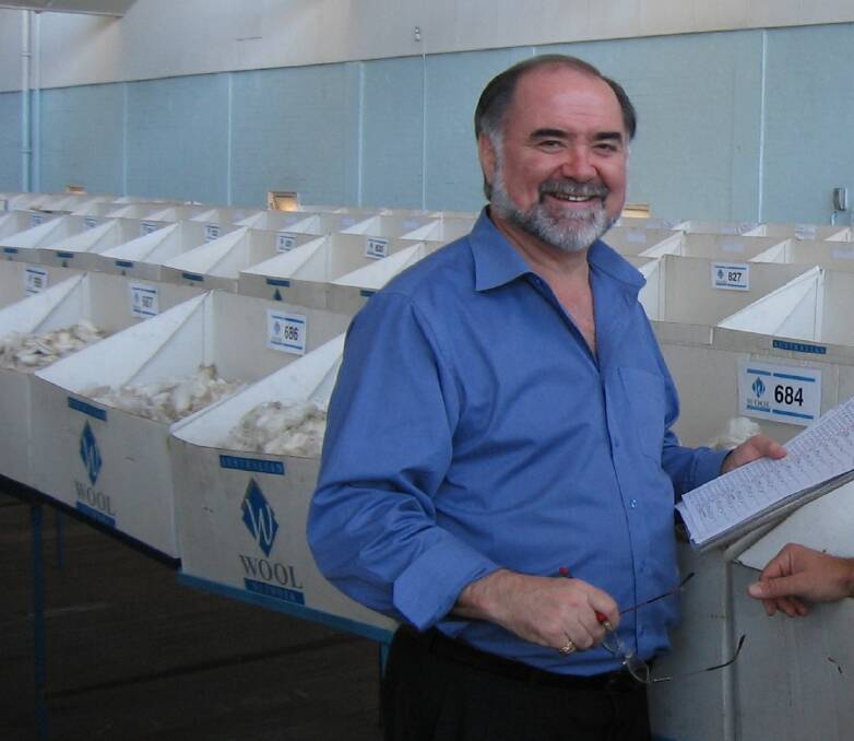Sydney-based wool industry identity Don Belgre checking over wool samples. Picture supplied.