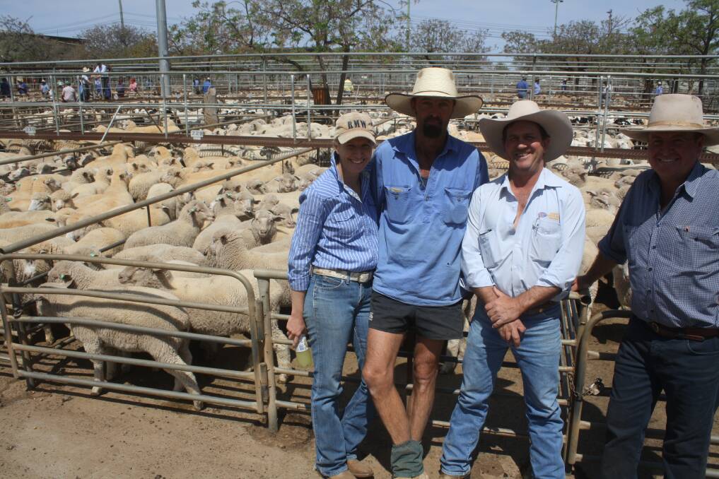 Emma and Murray Rees, Tomingley, sold sucker lambs at Dubbo for $180 and are with agents Jason Hartin, Narromine, and Mark Garland, Dubbo. Photo by Rebecca Sharpe.