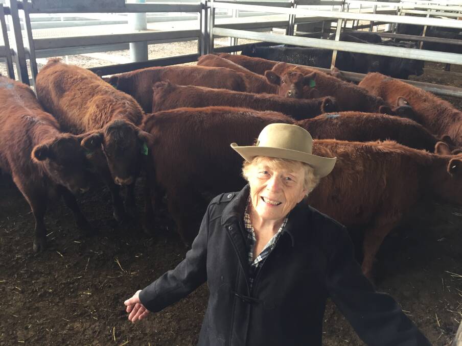 Sally Prass, Rigadoon, Cowra, with 276kg Red Angus heifers that sold for $1400/head during the Carcoar store cattle sale last Friday. Photos: Karen Bailey