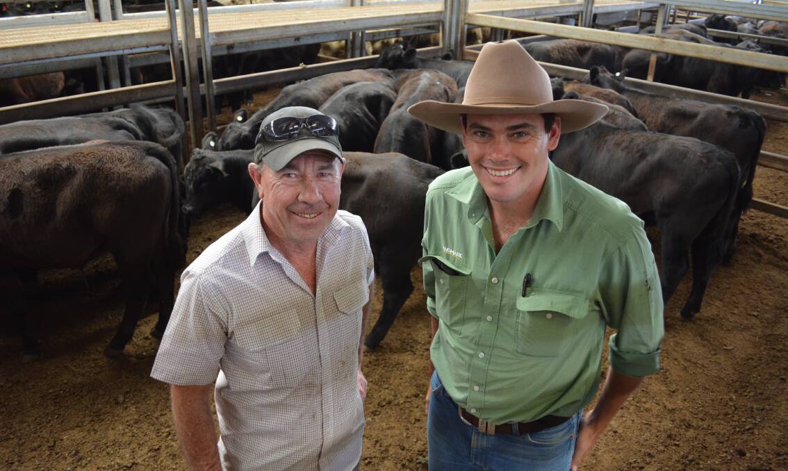 Allan Hudson, "Sunnymeade", Orange, with his Landmark Bathurst agent Marcus Schembri, bought a pen of 211 kilogram steers for $750 a head at Carcoar last Friday.