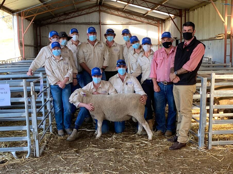 The Coronga White Suffolk team with Elders agents Scott Thrift and Martin Simmons and the $3600 ram that sold via AuctionsPlus to Vicky Geddes, Holbrook.