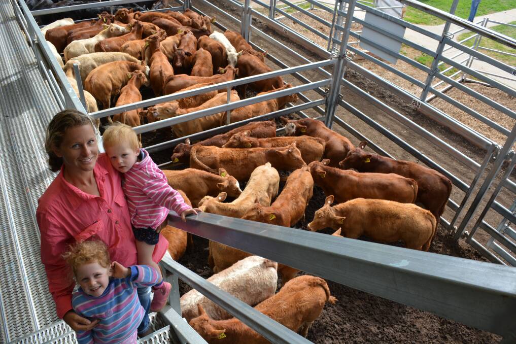 Stacey Clark, Clark Livestock, Lyndhurst, with her children Emma, 2, and Grace, 3, sold a pen of 14, 174 kilogram Limousin-cross steers for $665 a head at the Central Tablelands Livestock Exchange (CTLX), Carcoar, weaner sale last Friday.