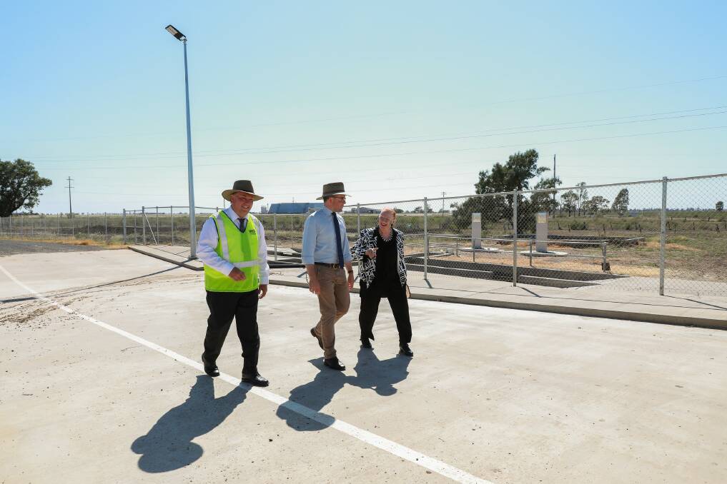 Moree Plains Shire Council general manager Lester Rogers, Northern Tablelands MP Adam Marshall and Moree Plains Shire Council councillor Kerry Cassells chat about the new Moree saleyards truck wash.