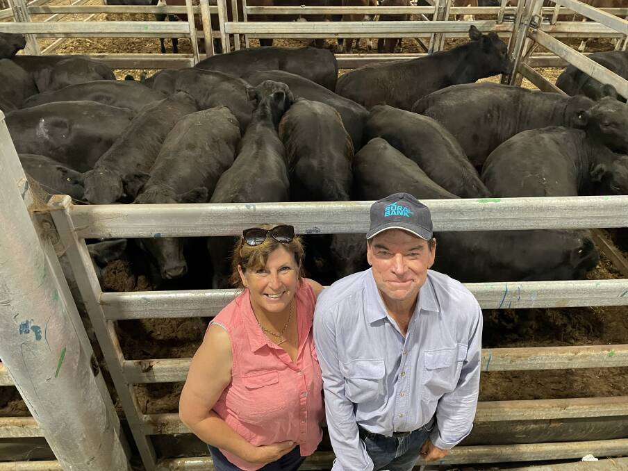 Claire and Peter McElroy, Raheen Park Partnership, Merrijig, sold 407 kilogram Angus and black baldy steers for $2540 a head during the Wodonga weaner sale on Friday. The Alpine- and Riga-blood steers were 10 to 11 months and had been grassfed and weaned. Photo: Karen Bailey