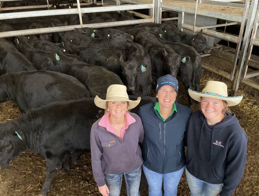 Eilish, Liz and Ellie Reen, Meadow Flat, with 338kg, Karoo-blood weaner heifers that sold for $1250 a head at Carcoar last Friday. Picture by Karen Bailey.