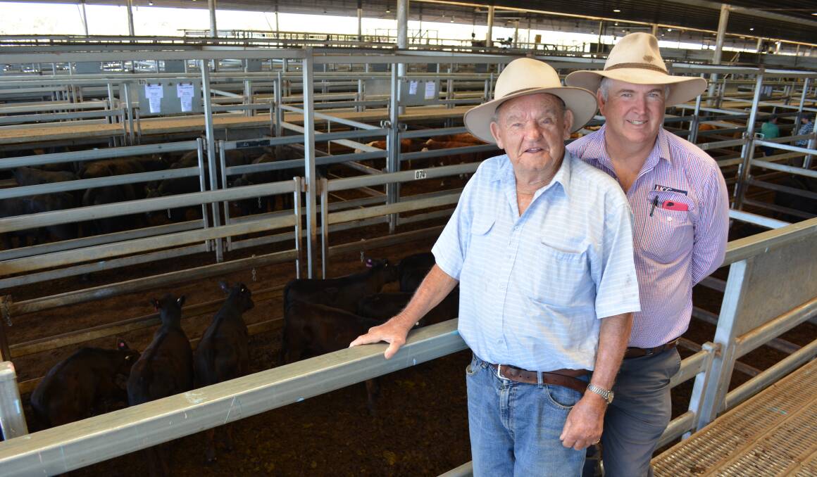 Des Redmond, "Kooralbyn", Orange, bought nine Angus steers for $665/head at Carcoar store sale last Friday. He is with his agent Lindsay Fryer, Orange. Photo: KAREN BAILEY