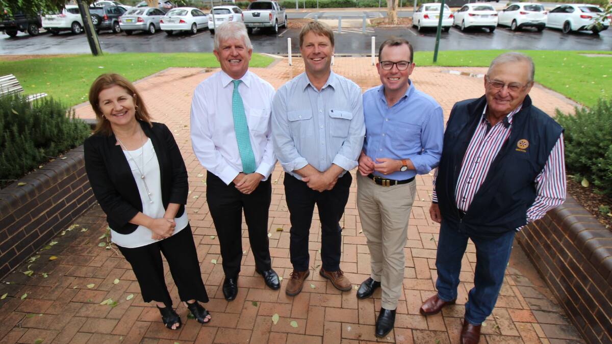 ALL SMILES: Then Member for Murray Austin Evans (centre), with then NSW skills minister Adam Marshall (second from right) announcing the TAFE NSW Shared Services Centre in Griffith, along with Griffith City Council's Shireen Donaldson, Brett Stonestreet and mayor John Dal Broi in March 2019.