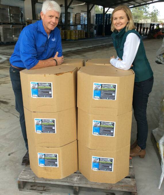 CARBON NEUTRALITY: Sam Stephens from start-up company Agcotech and northern Australian beef producer Julie McDonald, MDH, with greenhouse gas abatement blocks designed specifically for the pastoral industry.