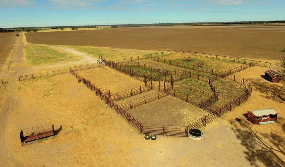 Improvements include steel cattle yards. 